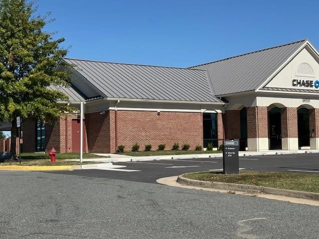 JPMC building in Fredericksburg with a charcoal standing seam metal roof